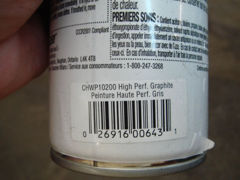 1996 Ford Bronco - A close-up of a spray paint can shows its product information and barcode.