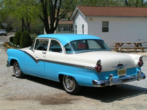 1956 Ford Fairlane - Rear view of a two-tone blue and white 1956 Ford Fairlane sedan.