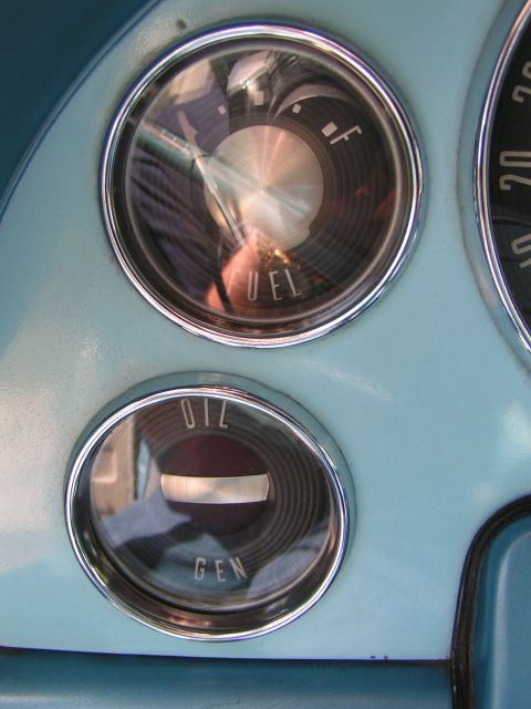 1956 Ford Fairlane - The dashboard features vintage gauges for fuel, oil, and generator status.