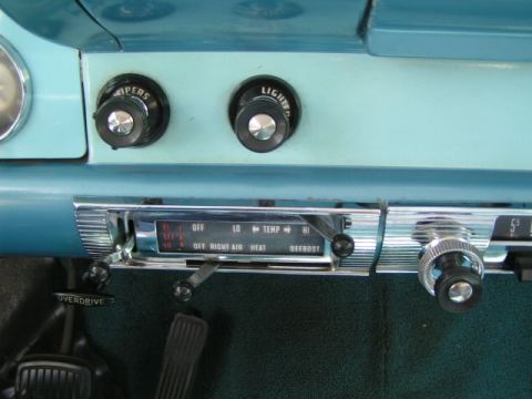 1956 Ford Fairlane - Dashboard controls for a 1956 Ford Fairlane, including radio, wipers, lights, and climate settings.
