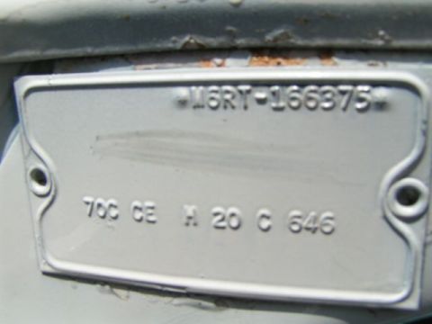 1956 Ford Fairlane - Vehicle identification plate showing stamped alphanumeric characters.