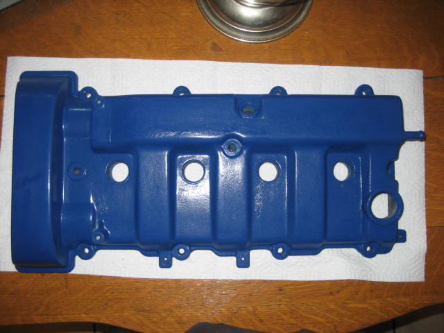Blue valve cover on paper towels