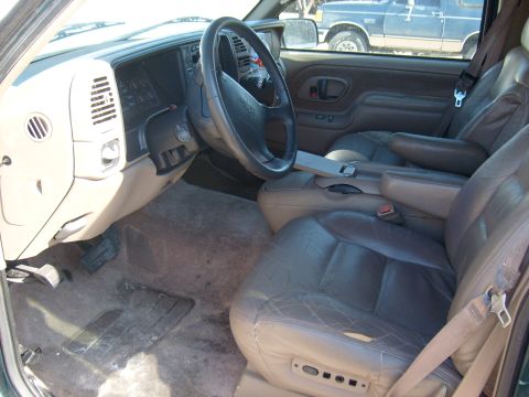 1995 Ford C-350 (Centurion Conversions) - Interior view of a 1995 Ford C-350 (Centurion Conversions) showing the dashboard and seating.