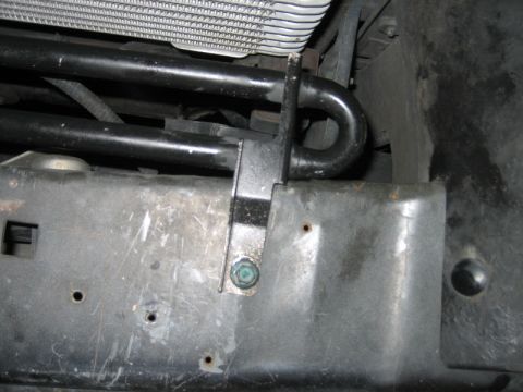 1996 Ford Thunderbird - This image shows the front bumper structure and cooling system components of a vehicle.