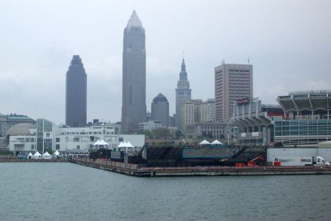 1971 Ford Ranchero - A view of the Cleveland skyline and waterfront on an overcast day, tall buildings and a stadium.