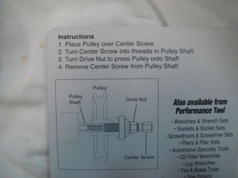 1996 Ford Bronco - Instructions detail the process for installing a pulley onto a shaft with specific tools.