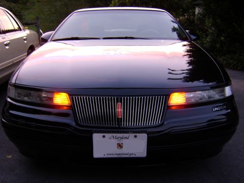 1996 Mercury Grand Marquis - Front view of a black 1995 Lincoln Mark VIII, with a Maryland license plate.