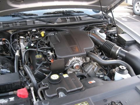 2004 Ford Crown Victoria - Engine bay of a 2004 Ford Crown Victoria, showing the V8 engine and associated components.