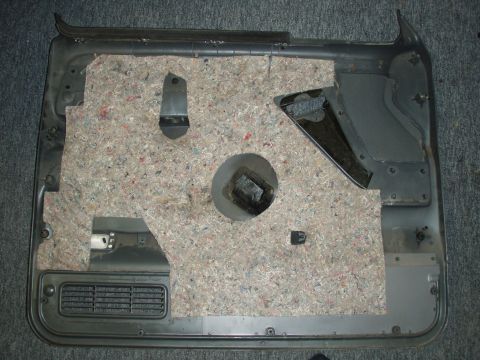 1992 Ford Bronco - driver side door pannel - you can see the old insulation that was used by ford years ago.