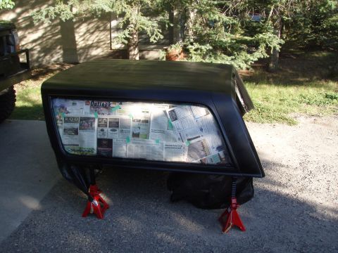 1992 Ford Bronco - re-painting the top. after 15 years the original black paint began to look dull. after a quick sanding i applyed the first coat of paint.