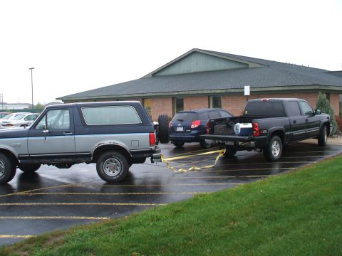 1990 Ford Bronco - Illegal Parking in need of tow.