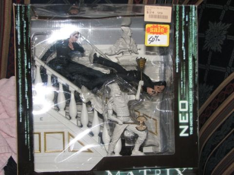 1991 Ford Bronco - Action figure set depicting Neo from The Matrix Reloaded, packaged with a staircase and other figures.