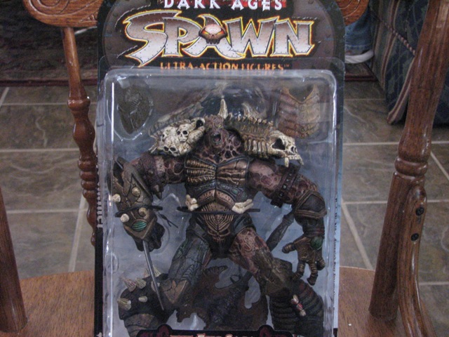Spawn Dark Ages action figure in plastic packaging, with text 'SPAWN ULTRA ACTION FIGURES'