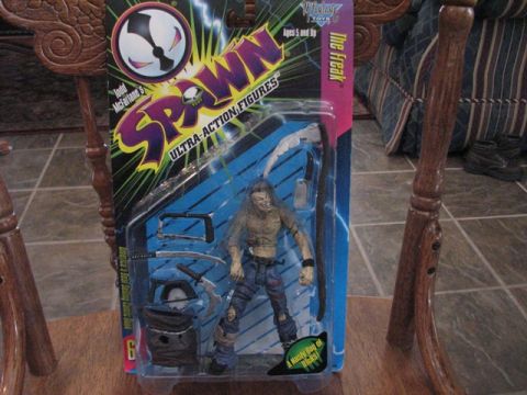 1991 Ford Bronco - Spawn The Freak action figure in packaging, with accessories visible.