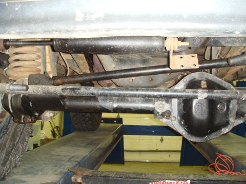 1996 Ford Bronco - Close-up view of the suspension and differential of a vehicle.