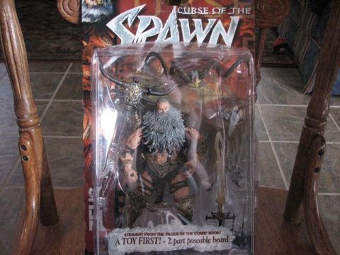 1991 Ford Bronco - A toy figure of Spawn is shown in its packaging, with text indicating it is from the comic book series.