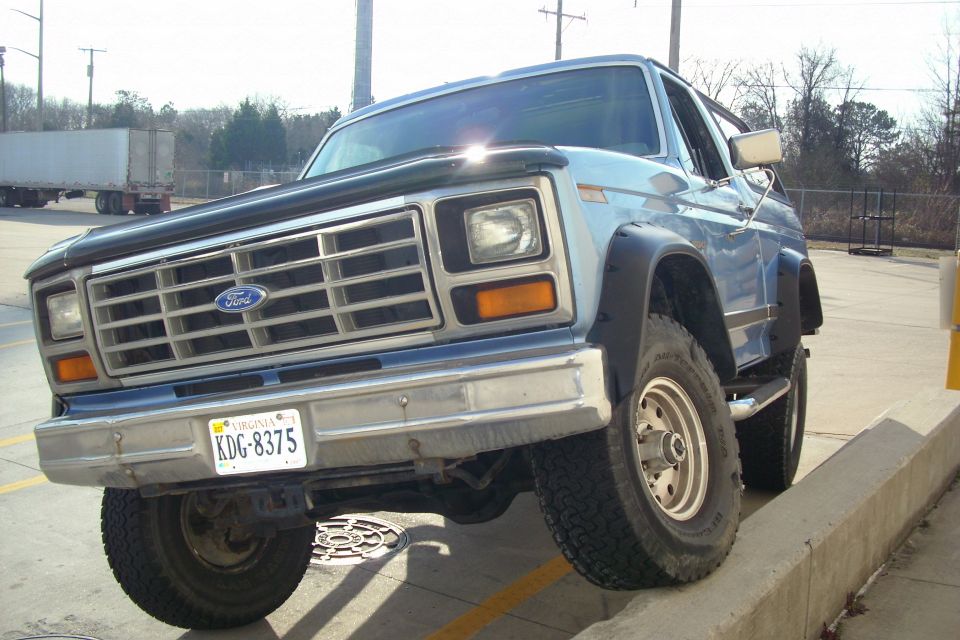Blue Ford truck front end with Virginia plate KDG-8375
