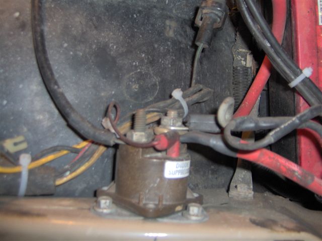 Engine bay starter solenoid with wiring and cables