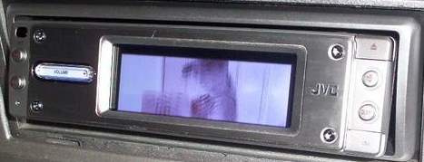 2006 Ford E350 - JVC player with screen-saver of hot UPS chick.