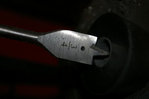 1986 Ford Bronco - A 3/4 inch spade drill bit is shown inserted into a drill chuck.