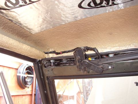 1975 Ford Bronco - The wiring above the windshield for the dome lamps & rear defroster now runs inside the wiper cover bracket so the headliner can lie flat(t…