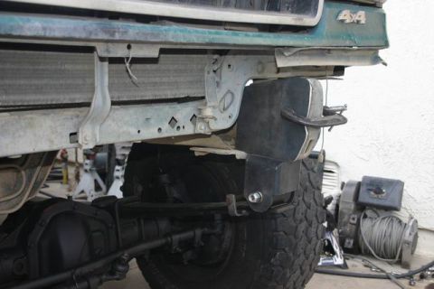 1991 Ford Bronco - Front view of a 1991 Ford Bronco showing the grille, fender, and suspension.