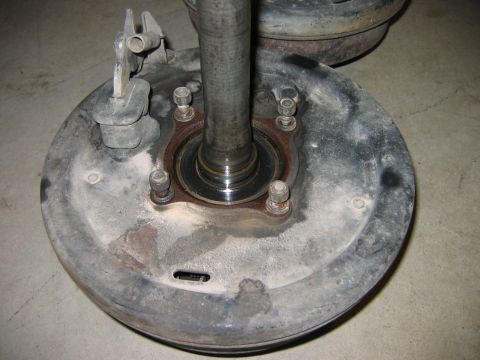 1983 Ferrari Enzo - Close-up view of a rear axle assembly, likely for sale, showing the brake drum and hub components.