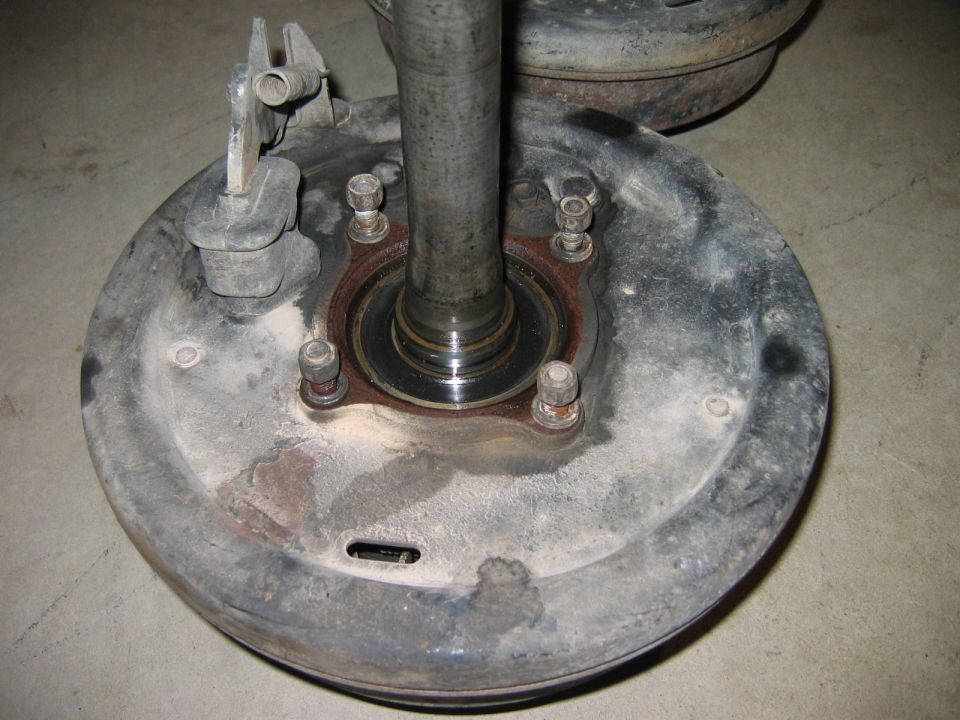 Rear brake drum on axle flange with six wheel studs and adjuster slot