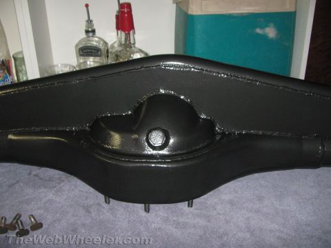 1968 Ford Mustang - A black painted rear axle housing is shown, likely a replacement part for a vehicle.