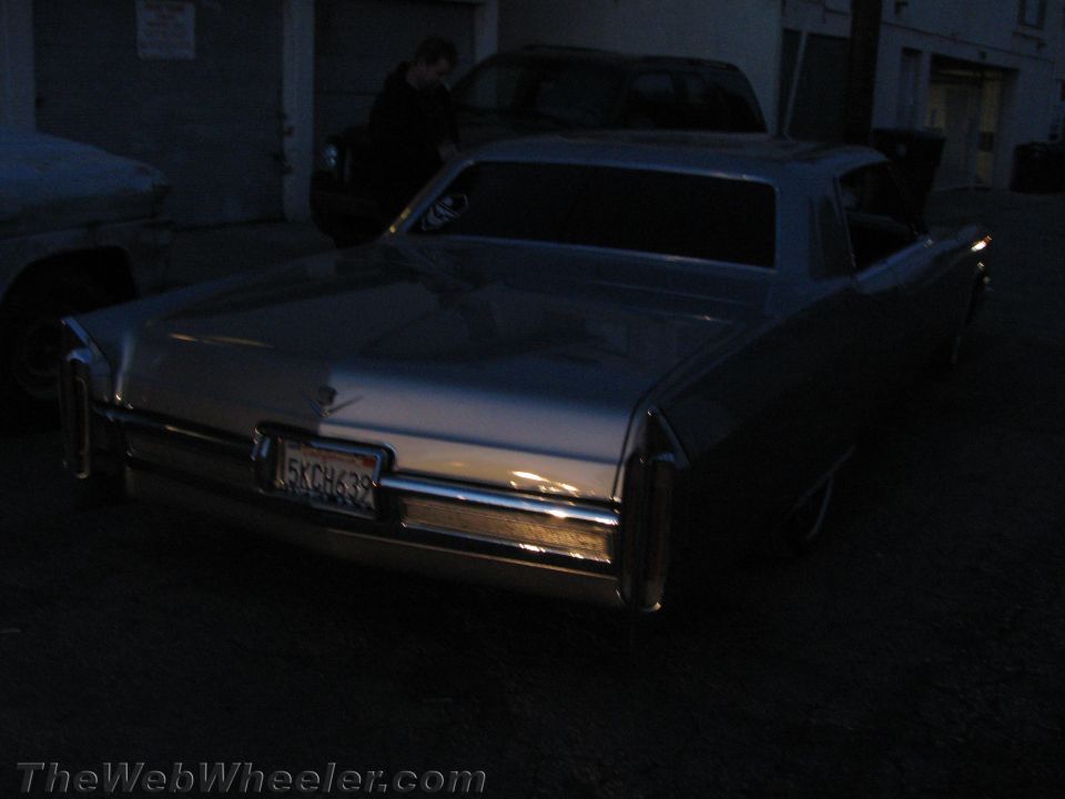 1967 Cadillac Coupe de Ville rear view, license plate 5KCH639. Another vehicle partially visible to the left