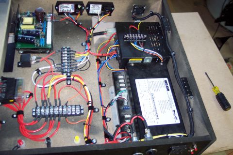 2001 Ford Crown Victoria - A detailed view of an intricate electrical wiring harness, numerous wires, connectors, and power distribution components.