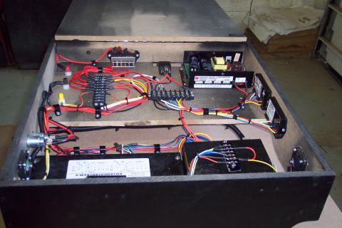 2001 Ford Crown Victoria - This image shows a complex electrical wiring system with multiple relays, fuses, and power distribution blocks housed within a black enclos…