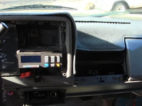 1983 Ford Bronco - you are left with these holes. one above the ac/heater adjust and one in the center of the dash.