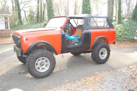 1994 Ford Bronco - This lifted International Harvester Scout II features a two-tone paint scheme and off-road tires.