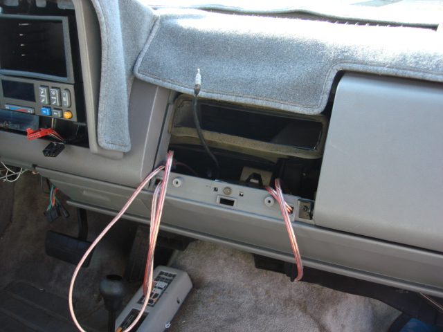 i ran the new wires to the new radio location. here are the 2 front speakers and antenna jack