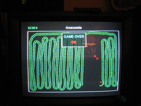 1988 Mercury Grand Marquis - A computer screen displays the game Anaconda with a "GAME OVER OK" message and a green snake graphic.