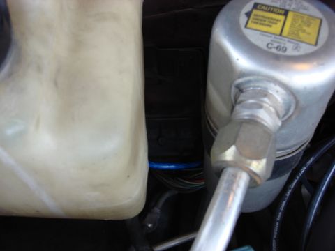 1983 Ford Bronco - i ran the power wire down and under the ac dryer.
