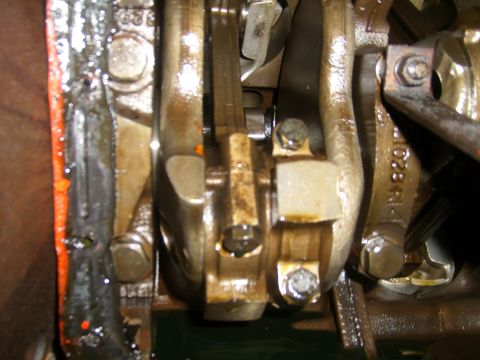 1994 Ford Bronco - This image shows internal engine components, specifically connecting rods and parts of the crankshaft.