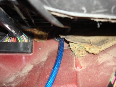 1983 Ford Bronco - i went behind the raditor over flow and thru the same gromet that the antenna went thru. i just trimmed a hold for it to pass thru.