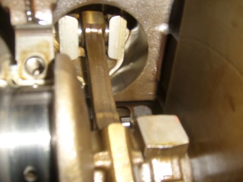 1994 Ford Bronco - Close-up view of internal engine components, including a connecting rod and crankshaft.