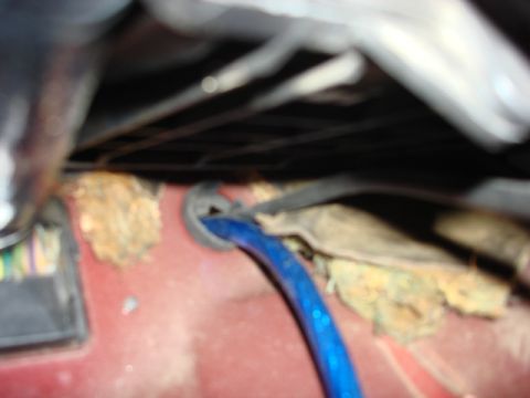 1983 Ford Bronco - here is a different view showing there was no share edgings near the wire and it does pass thru the gromet.