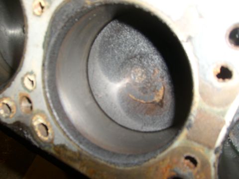1994 Ford Bronco - Engine cylinder bore shows signs of wear and carbon deposits.
