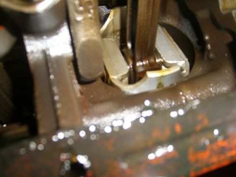 1994 Ford Bronco - This is a close-up view of an engine's connecting rod and crankshaft assembly, showing internal mechanical components.
