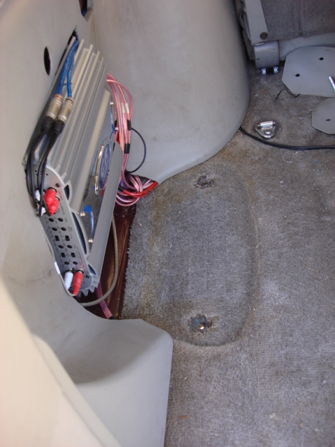 1983 Ford Bronco - a real fast cleanup and you can see the stock floor holes. there is a nut welded to the floor under the floor.