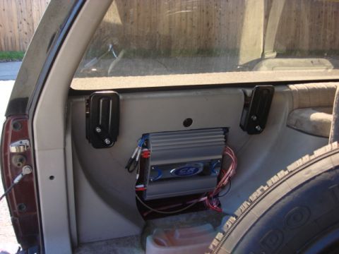 1983 Ford Bronco - ok- back to the tire install. i cut a couple 2X4 blocks to space the tire out some. i had to cut 2 45 degree angles on the bottom to fit in…