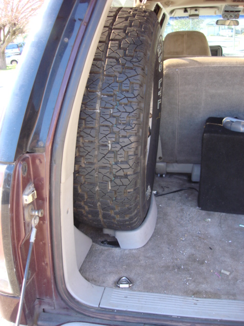 1983 Ford Bronco - here is the final install. there is plenty of room for the amp and spare tire. it almost looks like the factory installed this. i am still…
