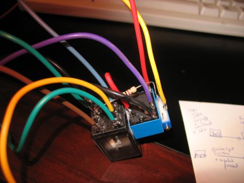1995 Ford C-350 (Centurion Conversions) - A close-up view of a complex automotive wiring harness multiple relays and a hand-drawn schematic.
