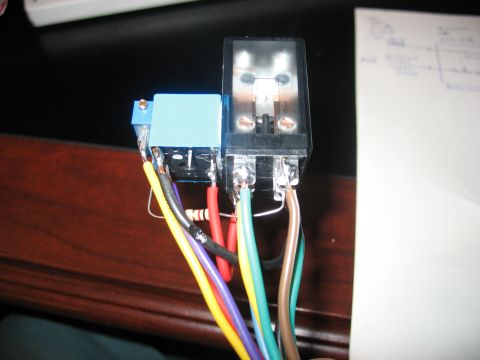 1995 Ford C-350 (Centurion Conversions) - Close-up of electrical relays and wiring, with a diagram visible in the background.