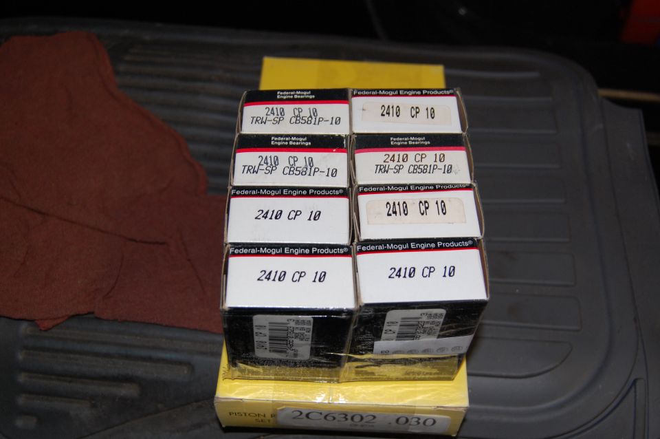 Stack of Federal-Mogul engine bearing boxes, some labeled 2410 CP 10
