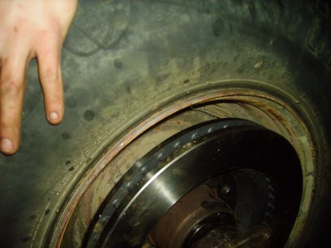 1991 Ford Bronco - Close-up view of a tire and brake rotor assembly, likely from a truck or SUV.